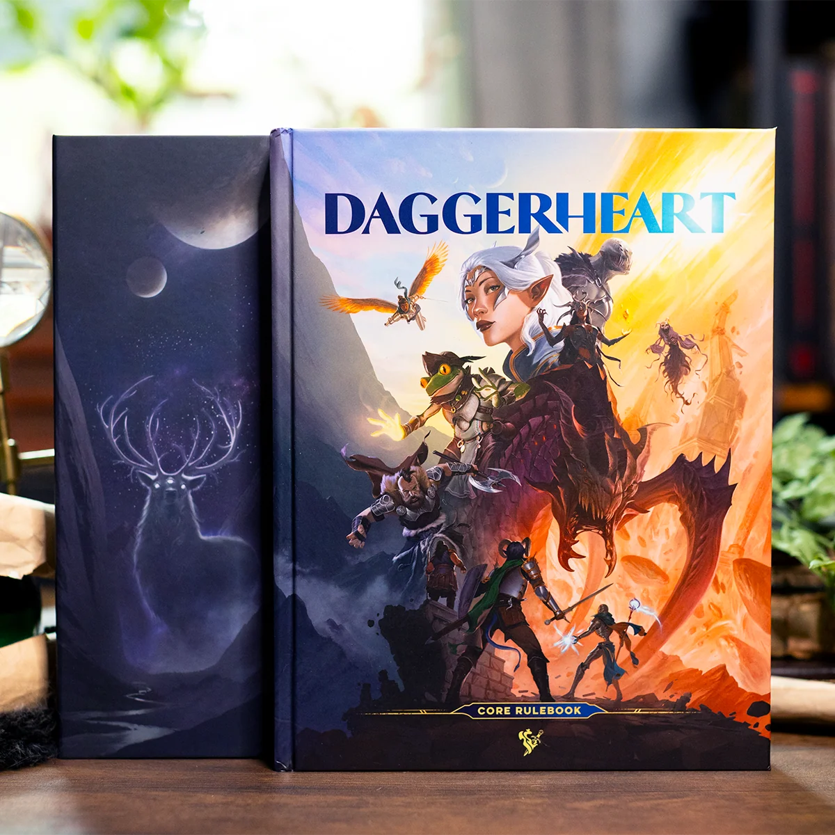 Daggerheart Core Set RPG game components including cards, tokens, and rulebook from Darrington Press, arranged on a table.