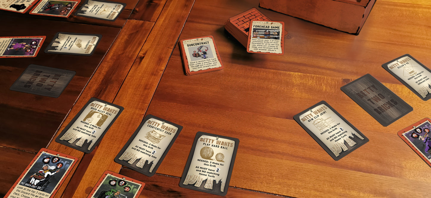 Cards from family card game Betty Two Bricks in situ on the table.