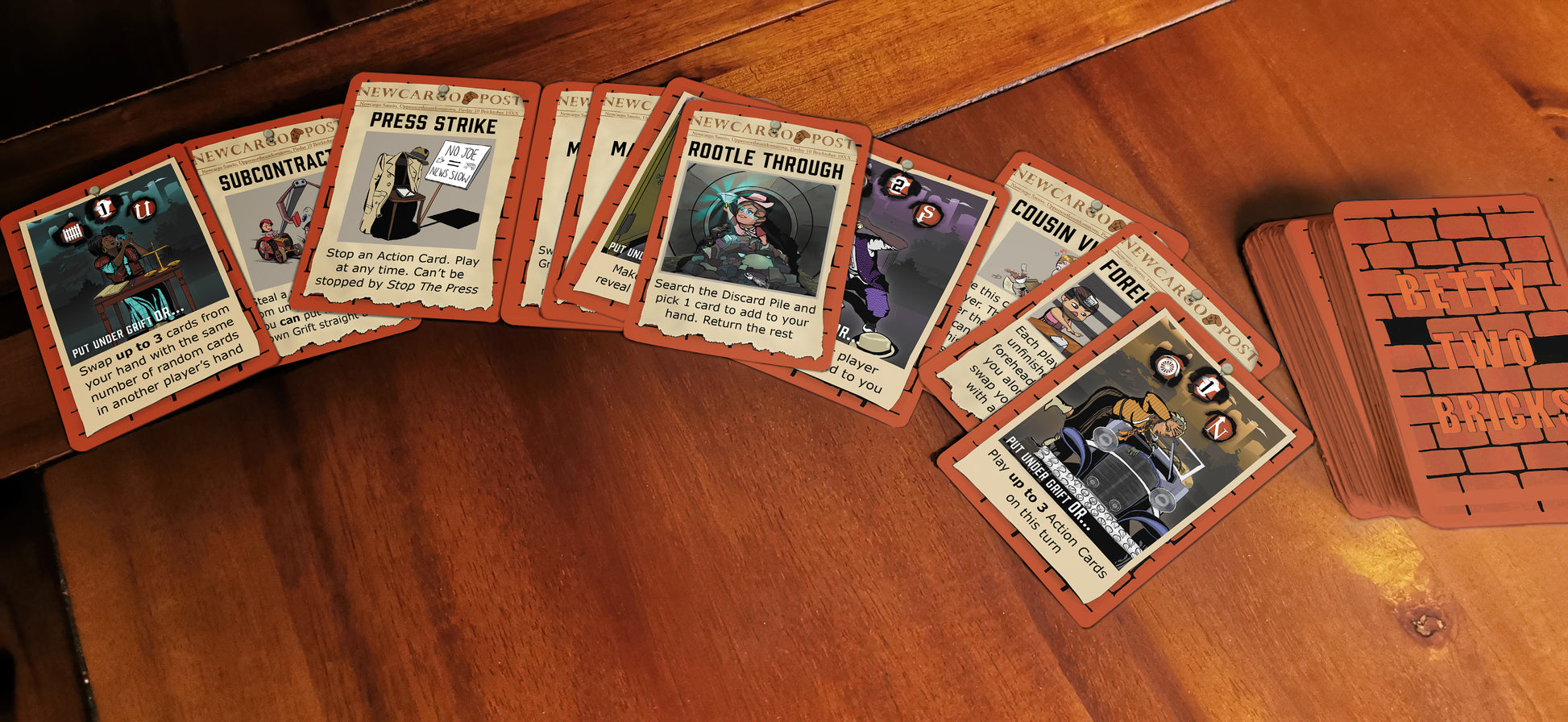 Some of the Action and Mob Cards from easy to play card game Betty Two Bricks spread out on a table next to a large stack of cards face-down.