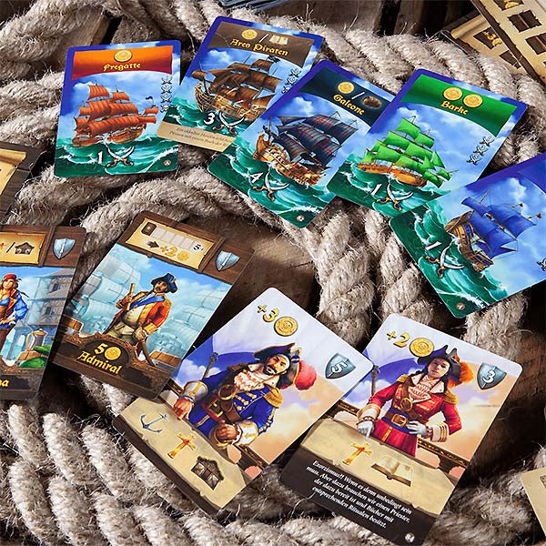 Image of Port Royal Card Game: Big Box Edition game cards. This game by Pegasus Spiele is available at indie online boardgames and card games retailer Kaioss Games